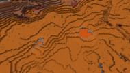 The nearby badlands biome's lava pools (Image via Minecraft)